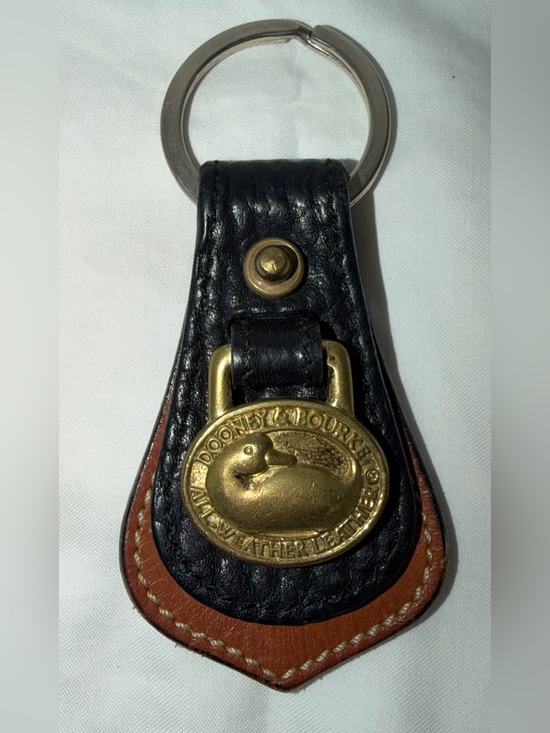 Dooney & Bourke Accessories - Vintage Dooney & Bourke Black Brown Leather Key Fob with Brass Duck Medallion